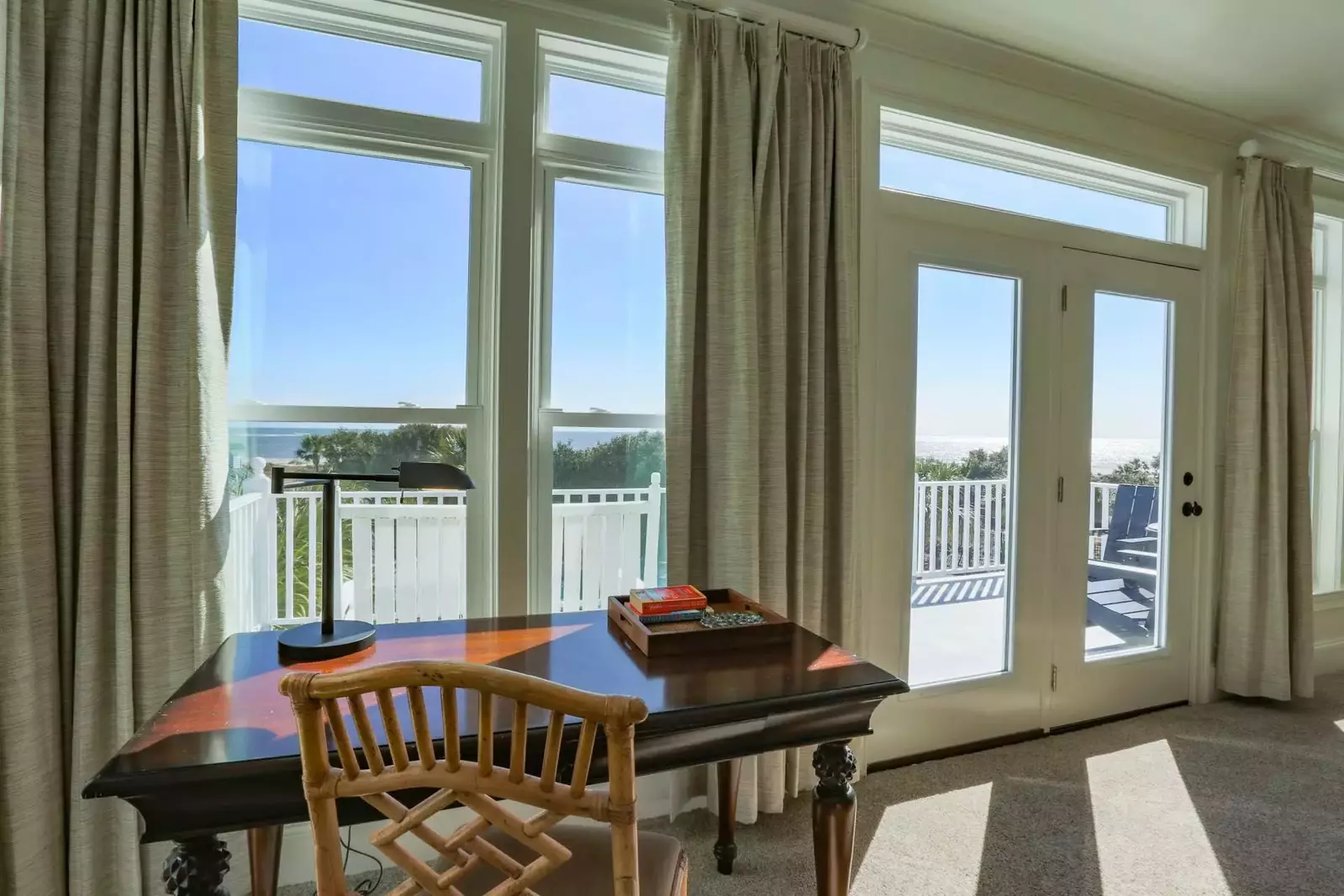 This desk near the master suite's private balcony is the perfect spot to make a call or get some work done.