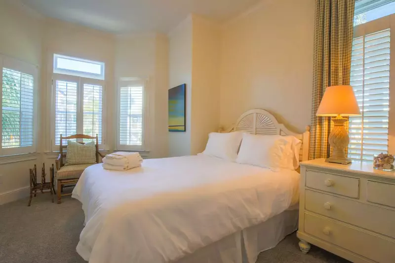 This guest bedroom, located on the home's lower level, looks out the front side of the home.