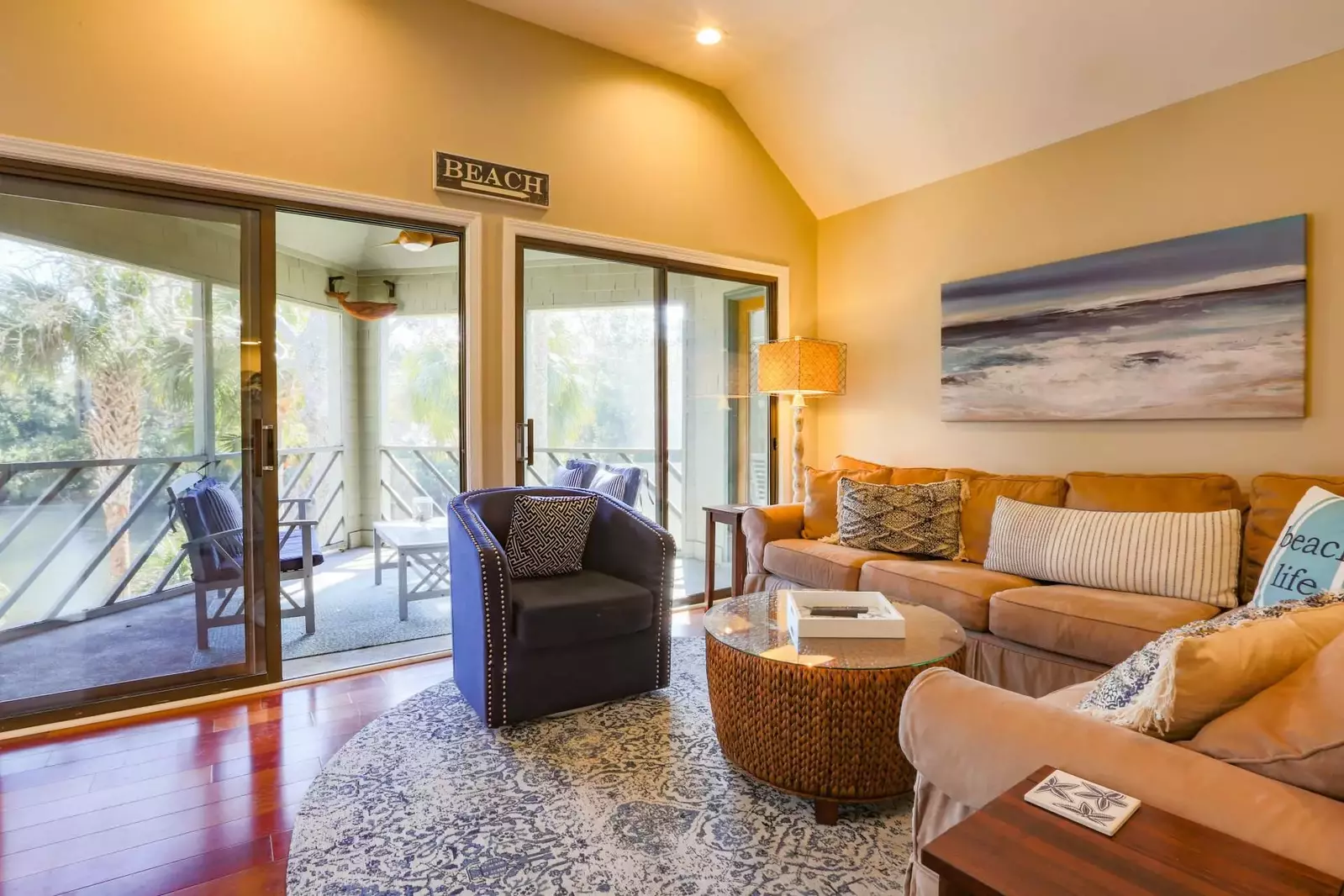 Let's Do Sunset has a fabulous screened porch off of the living room & master suite.
