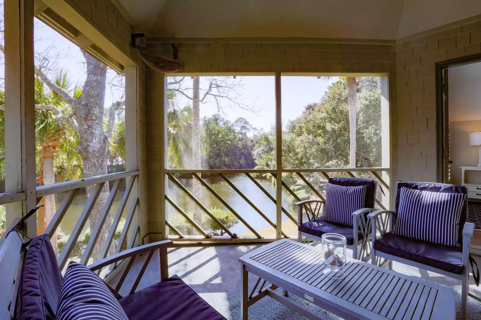 You can access the screened porch from the master suite, living room and kitchen.