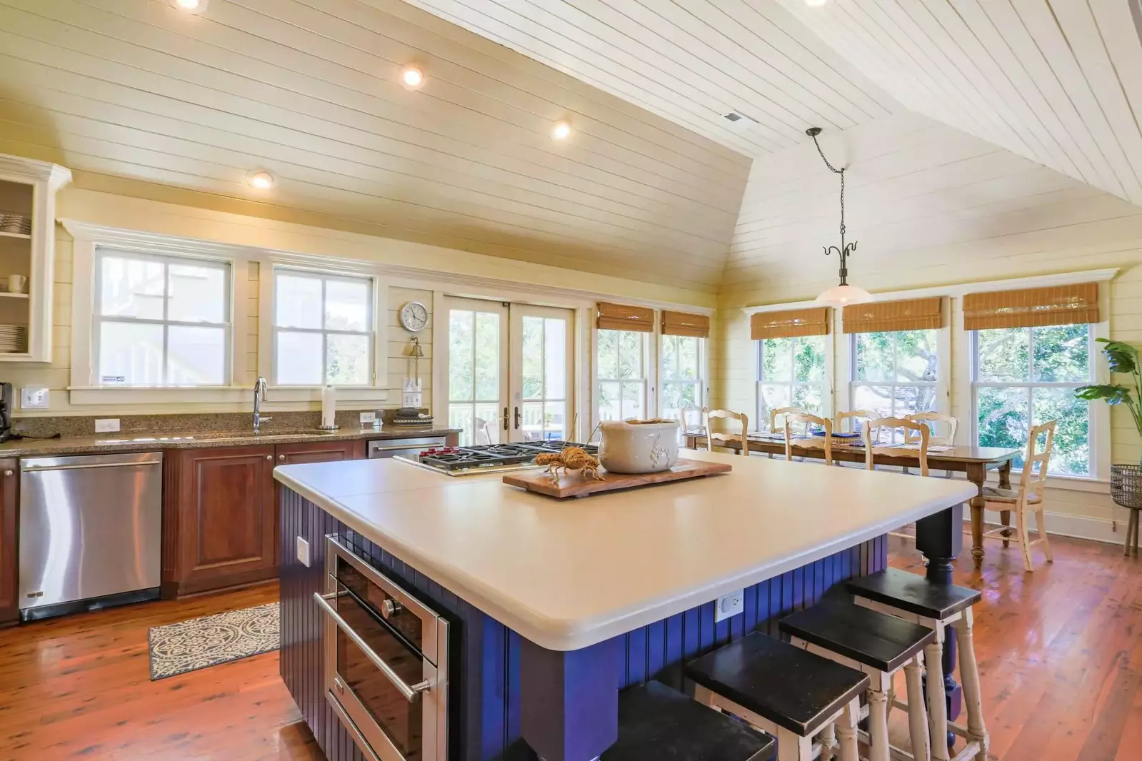 Deja Blue features a reverse floor plan with the kitchen, living room, dining area and den situated on the top floor.