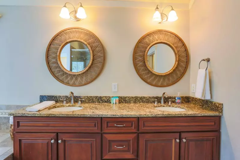 The master suite features this en suite bathroom with a double sink vanity.