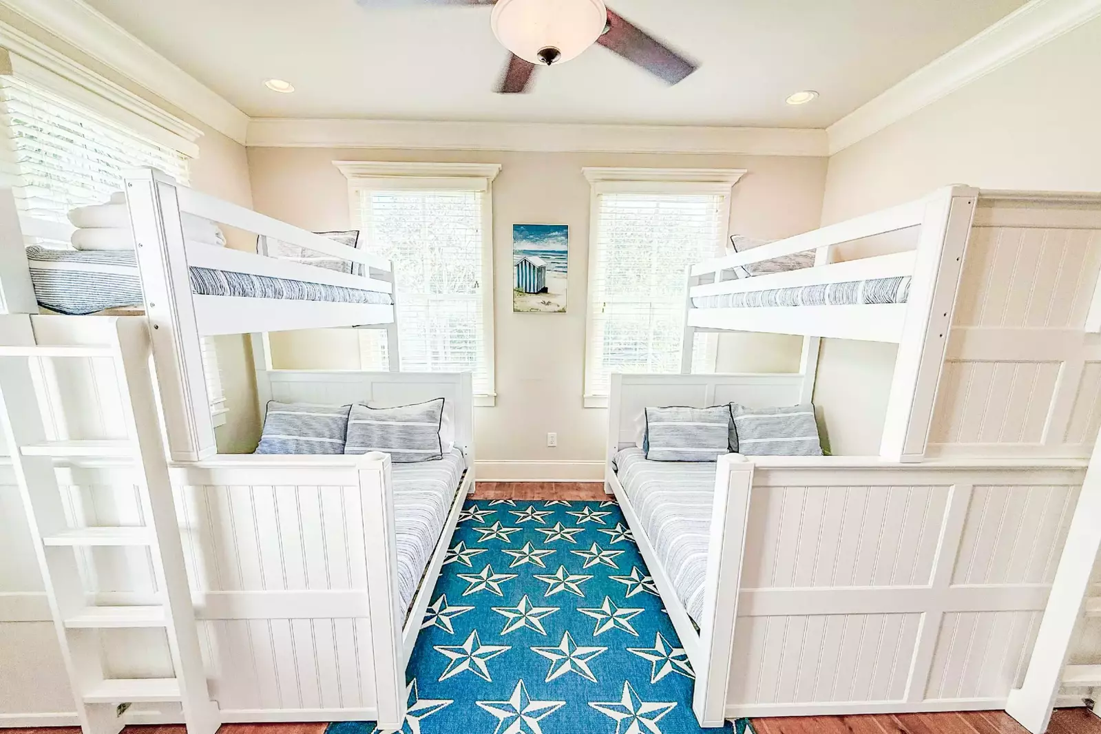 Each of the two bunk beds has a queen bed on the bottom and a twin bed on the top.