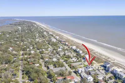 The Penthouse is this close to the beach!