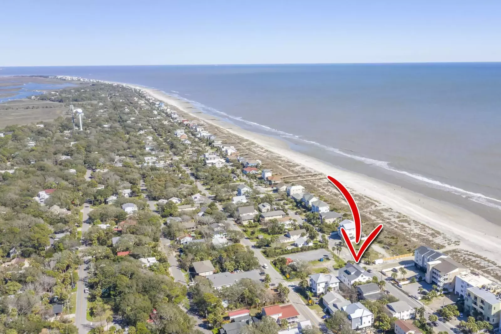 The Penthouse is this close to the beach!