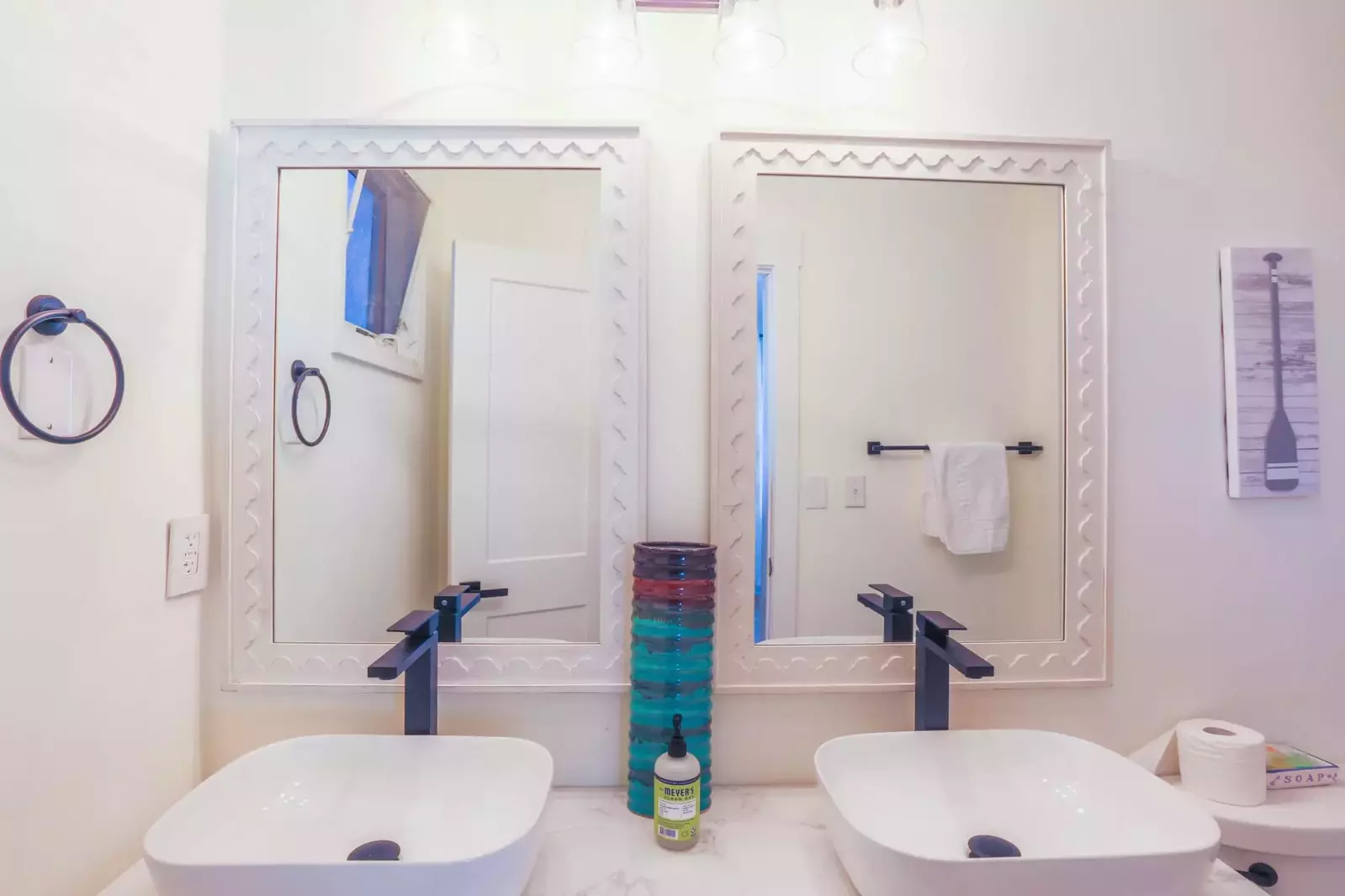 This en suite bathroom features a double sink vanity.