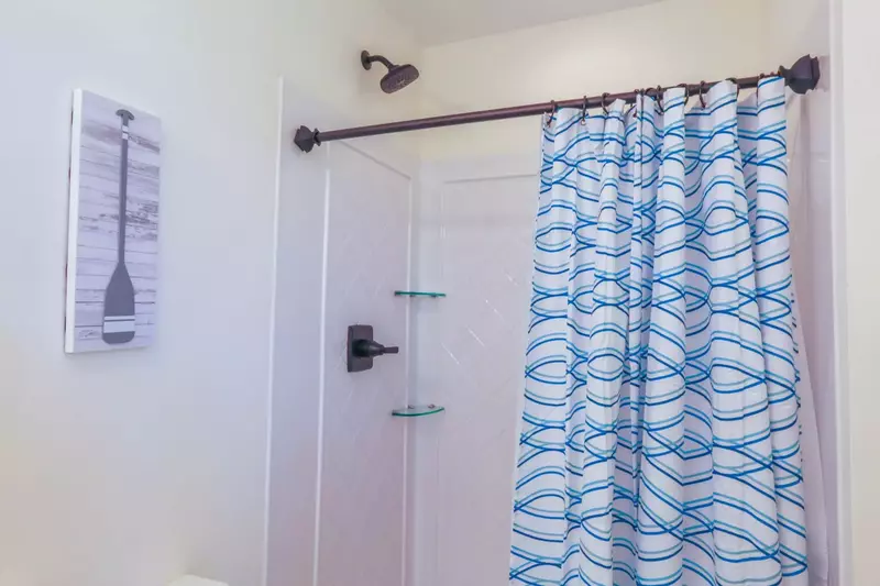 There is also a walk-in shower in this en suite bathroom.