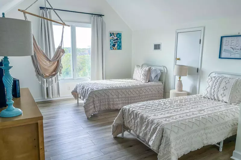 The bedroom also receives lovely natural light.