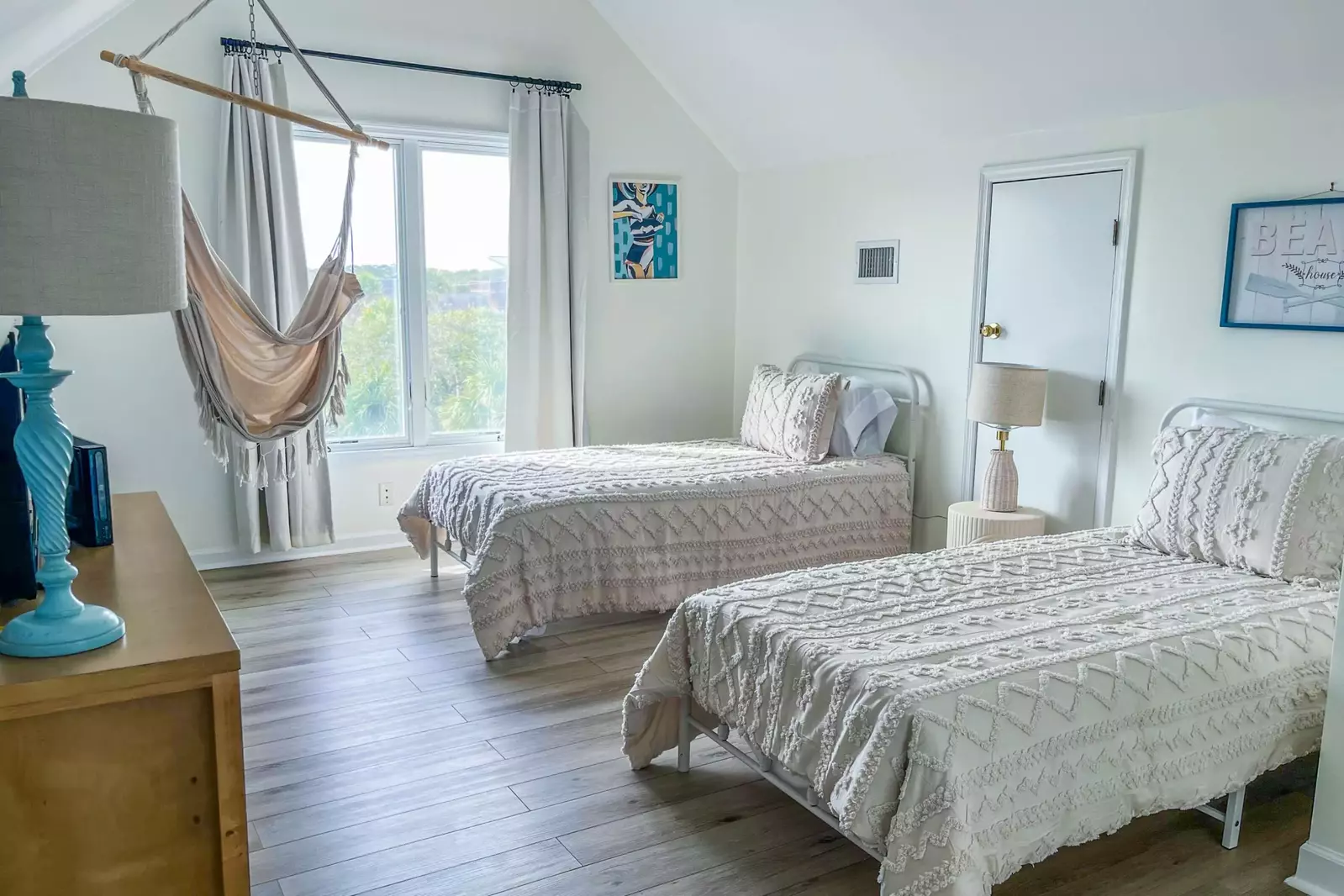 The bedroom also receives lovely natural light.