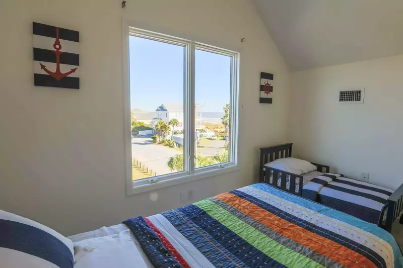 This bedroom also has ocean views.