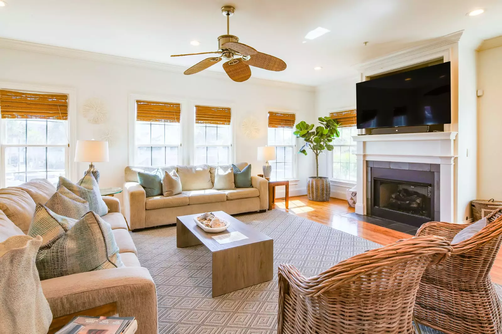 All For You features this spacious living room with mounted large screen TV.