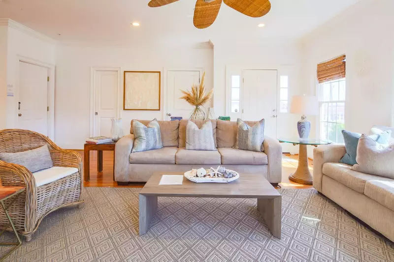 When you walk into the front door, you'll find the home's spacious & comfortable living room.