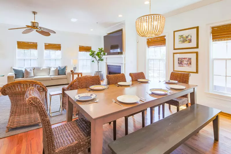 This home features coastal-themed furnishings & decor as well as wonderful natural light.