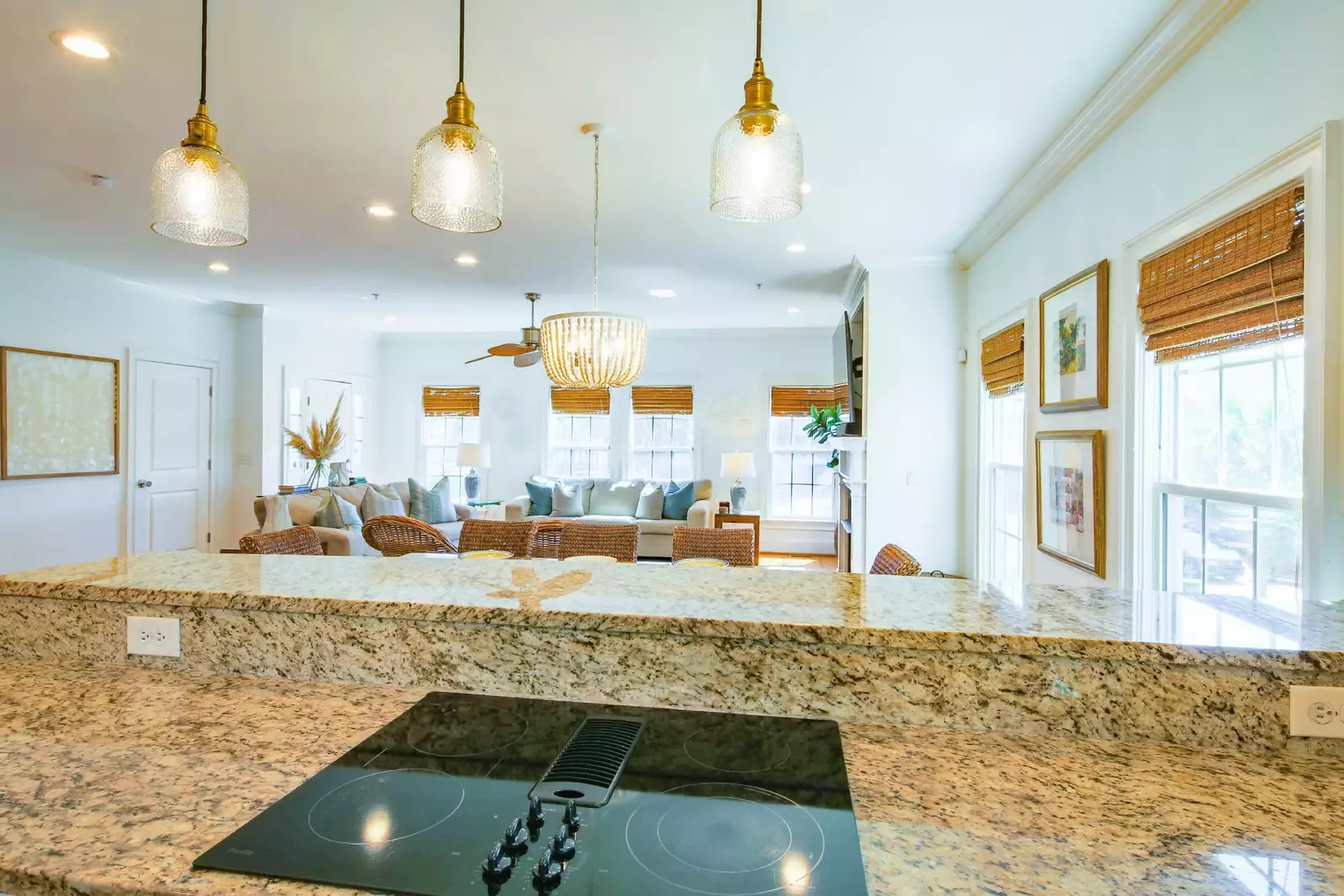 The open floor plan makes it very easy to interact with guests in the kitchen, dining area & living room.