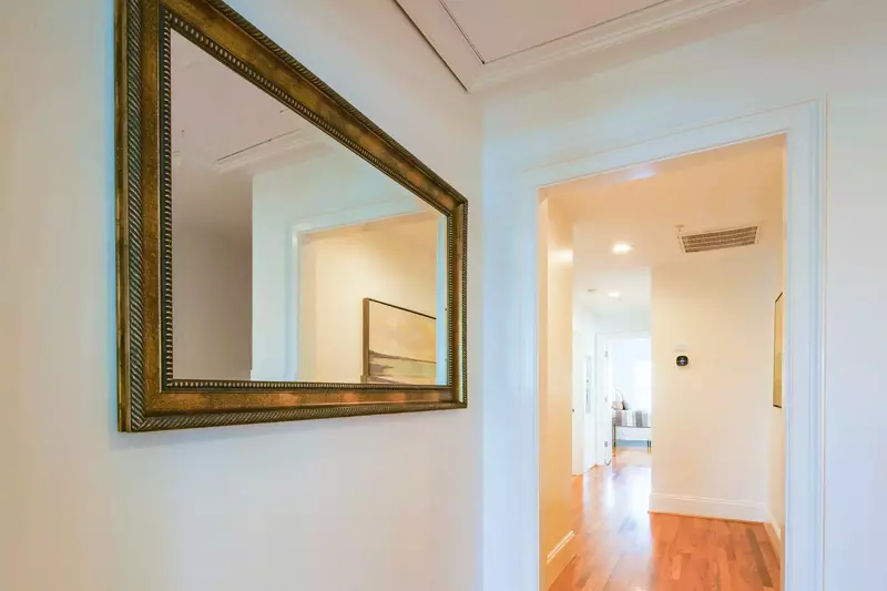 The master suite is on the top floor at the end of this hallway.