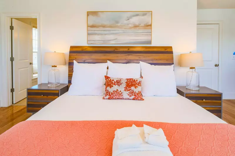The master suite also has an en suite bathroom through the door on the left in this photo.