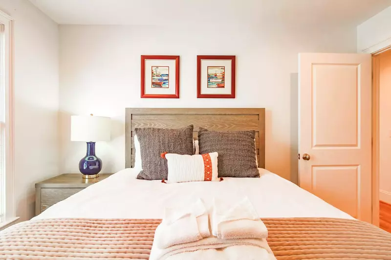 This second floor guest bedroom also has a queen bed.