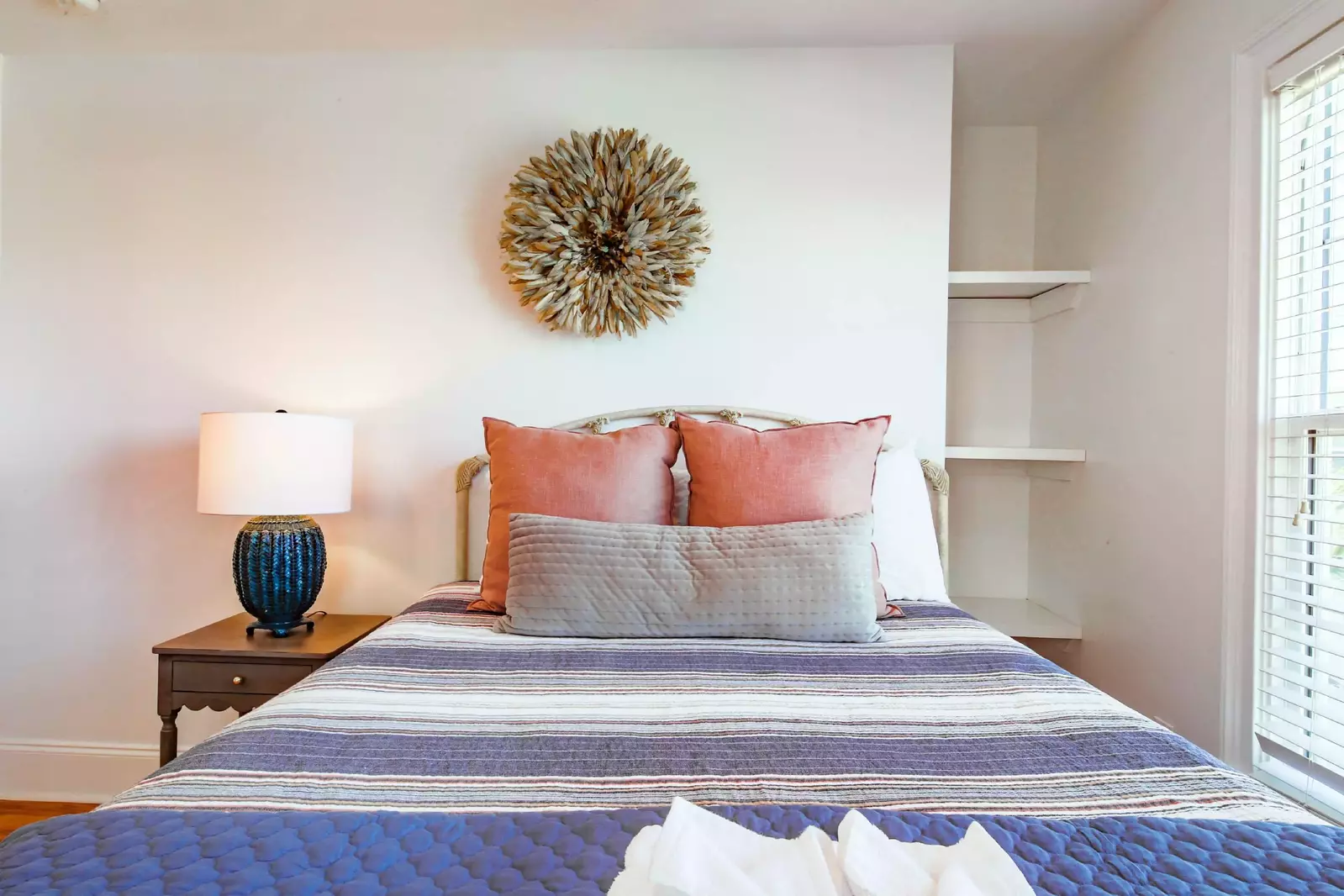 This second floor guest bedroom has a queen bed.