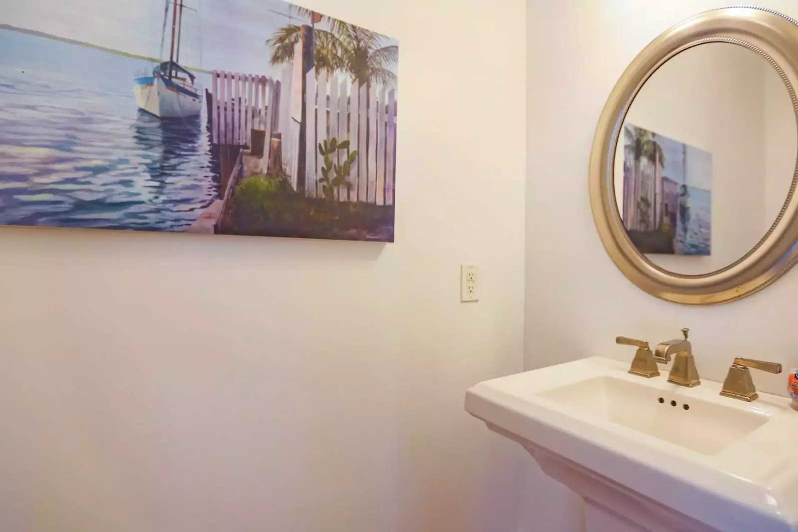 This half bathroom is located on the home's lower level.
