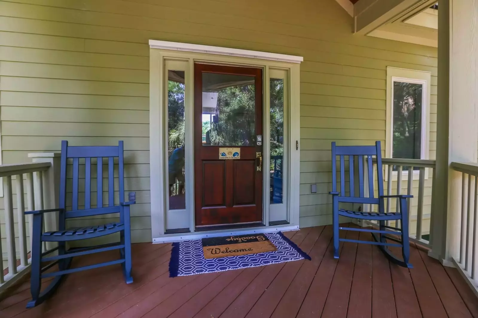 You will be welcomed to the covered front porch by these two rocking chairs.