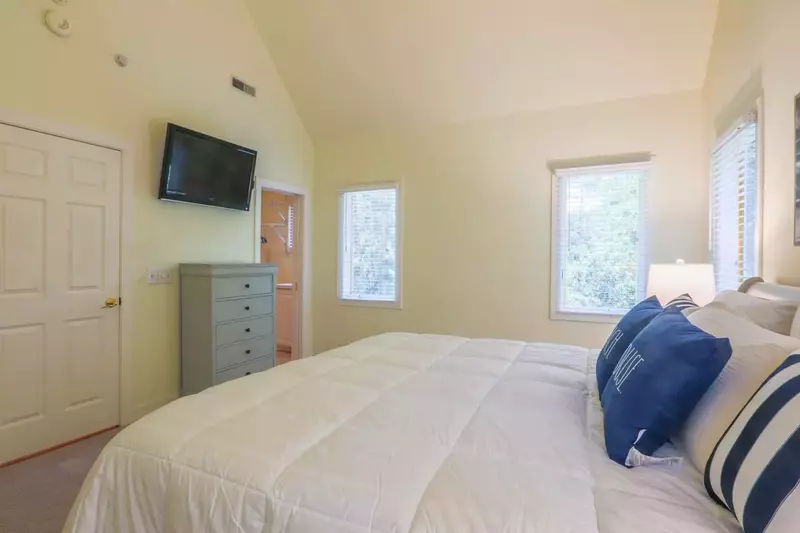 There's also a mounted smart TV and an en suite bathroom in the master suite.