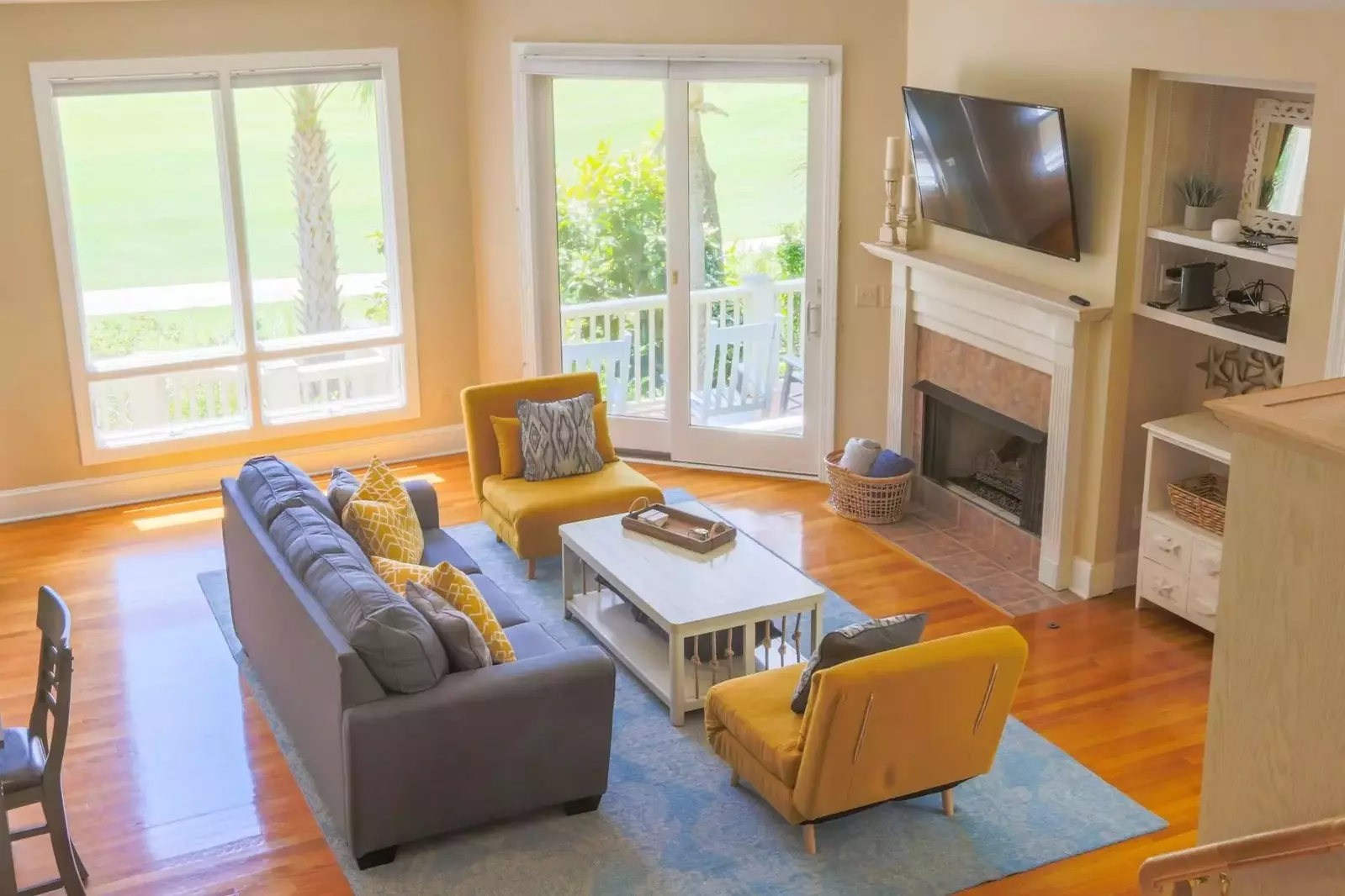 When you walk down the stairs from the master suite, you'll enter the living room.