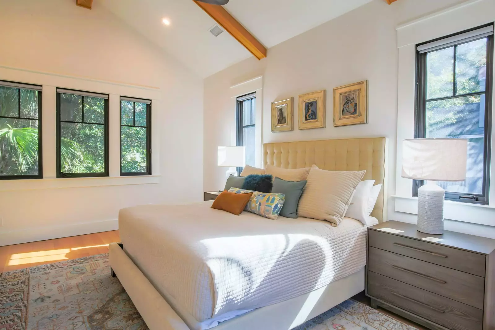 The primary suite features vaulted ceilings, a king bed and gorgeous natural light.
