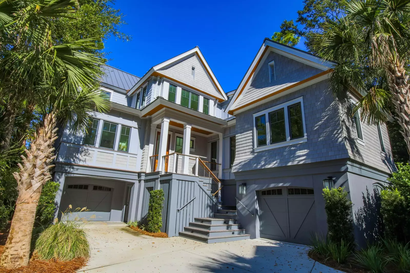 Marsh Point is an elevated, two-story home situated alongside the marsh.