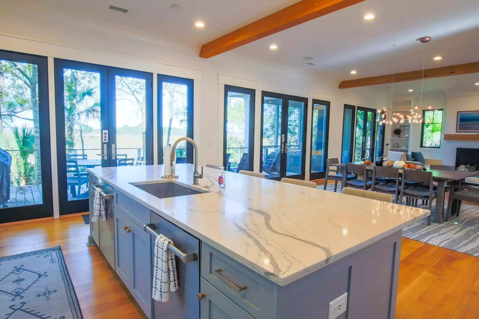 Step out through any of these doors to access the back porch.