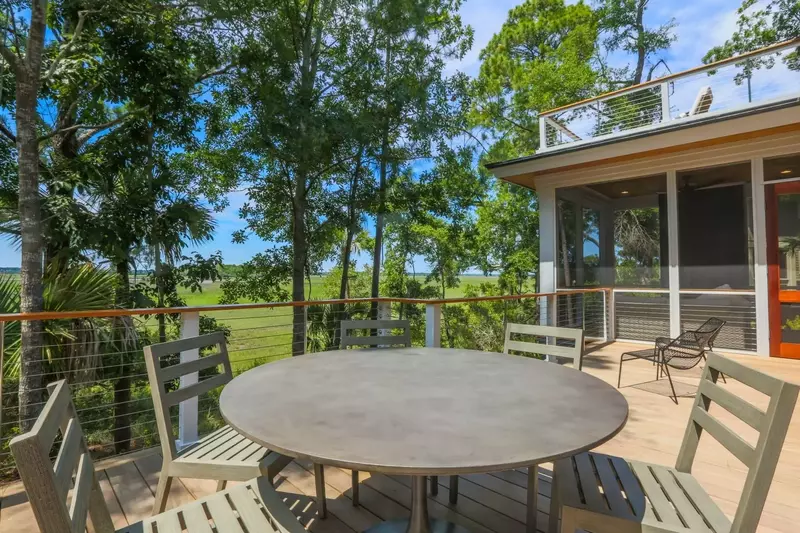Between the multi-level back decks and screened porch, this house features an incredible amount of outdoor space.