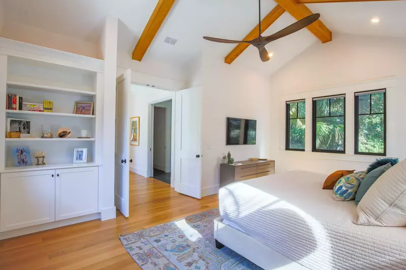 The primary suite is situated away from the remainder of the home, providing you additional privacy & solitude.