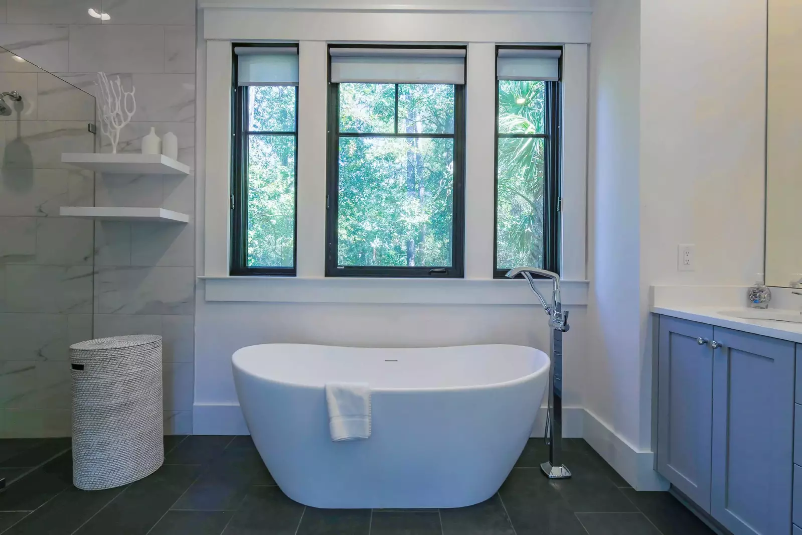 Soak your cares away in the standalone bath tub.