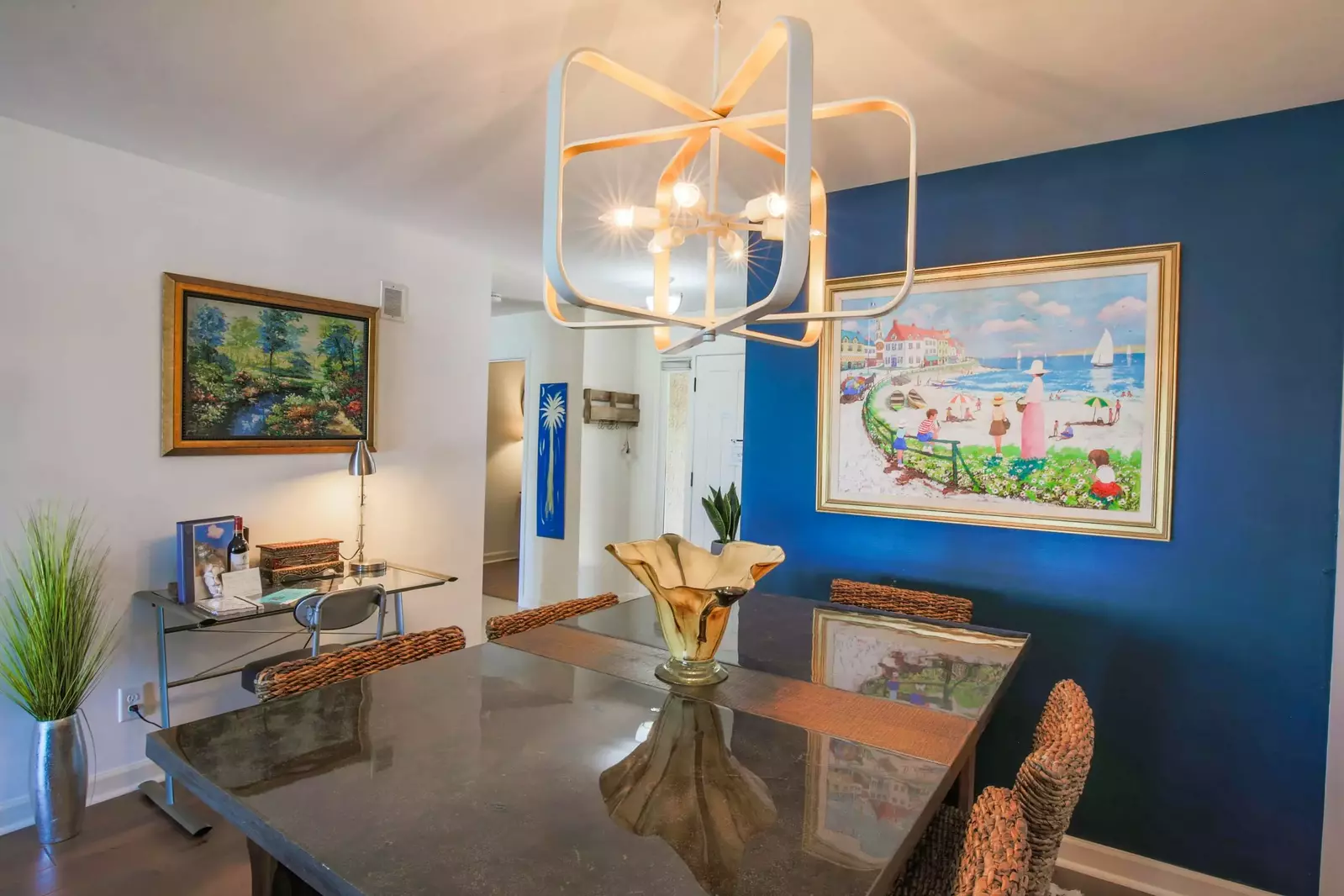 When you enter the home, you'll find the dining room and living room areas.
