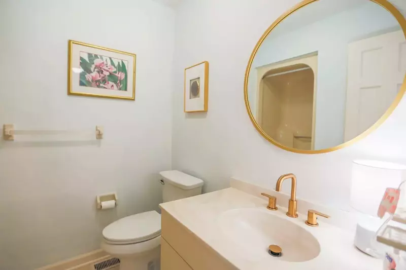 This is one of the condo's two full bathrooms.