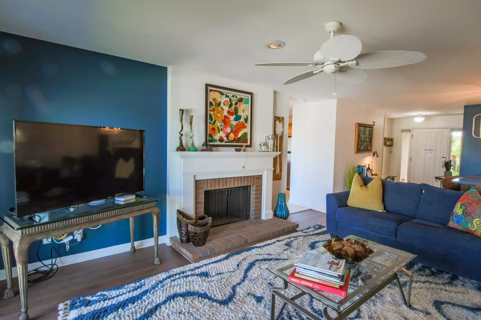 The doorway to the right of the fireplace takes you to the kitchen and bedroom suite.