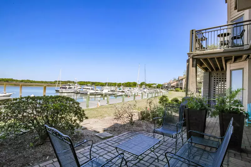 This seating area on the open patio is the perfect spot for your morning coffee or evening beverage.