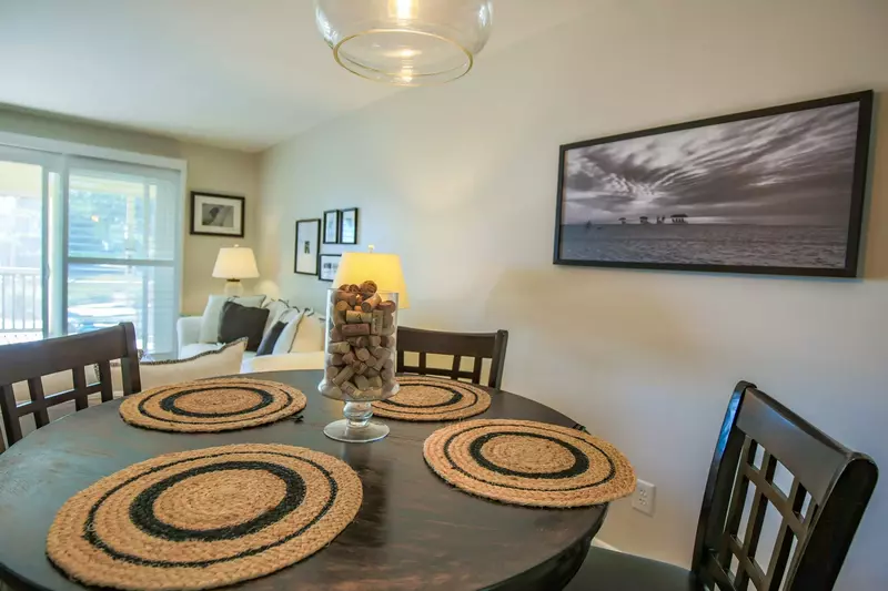 The dining table comfortably seats 4 people.