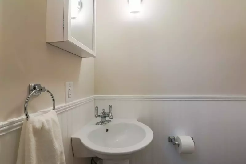 There's a half bathroom tucked away near the kitchen on the first floor.