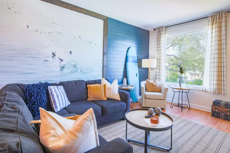 This vacation home features a fun & comfortable beachy, surf vibe.