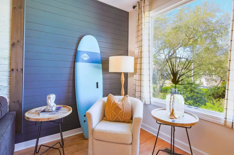 The living room gets terrific natural light from this large window.