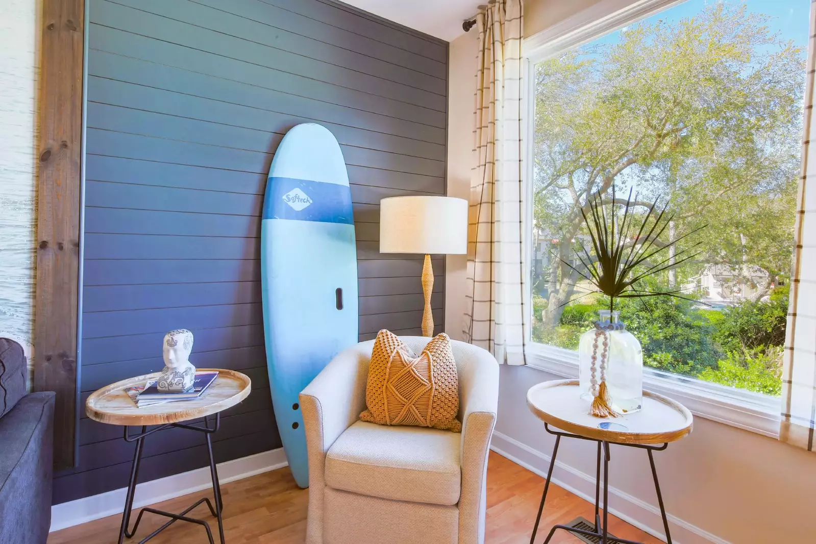 The living room gets terrific natural light from this large window.