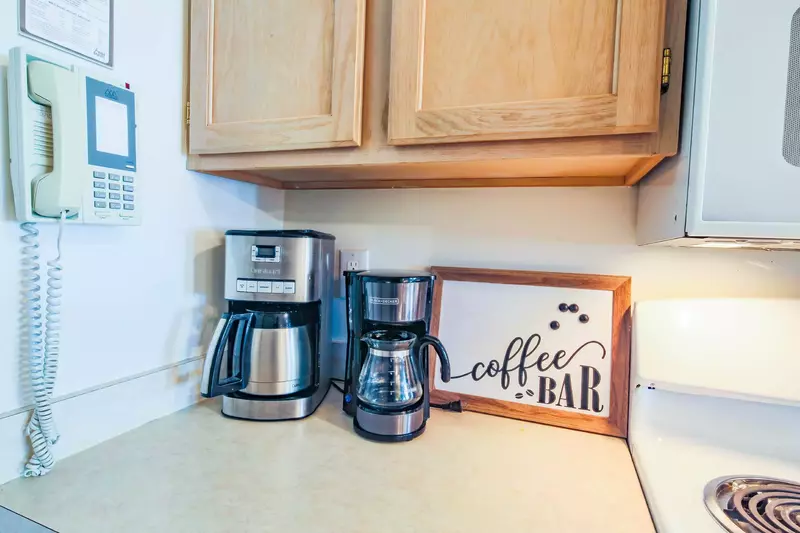 There is a coffee bar within the kitchen.
