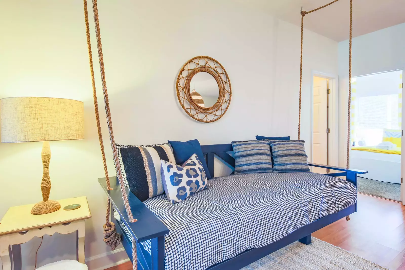 The hallway bathroom and the guest bedroom are located on the right side of the swing bed.