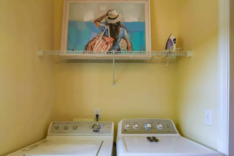 There is a full-sized washing machine and dryer in the condo.