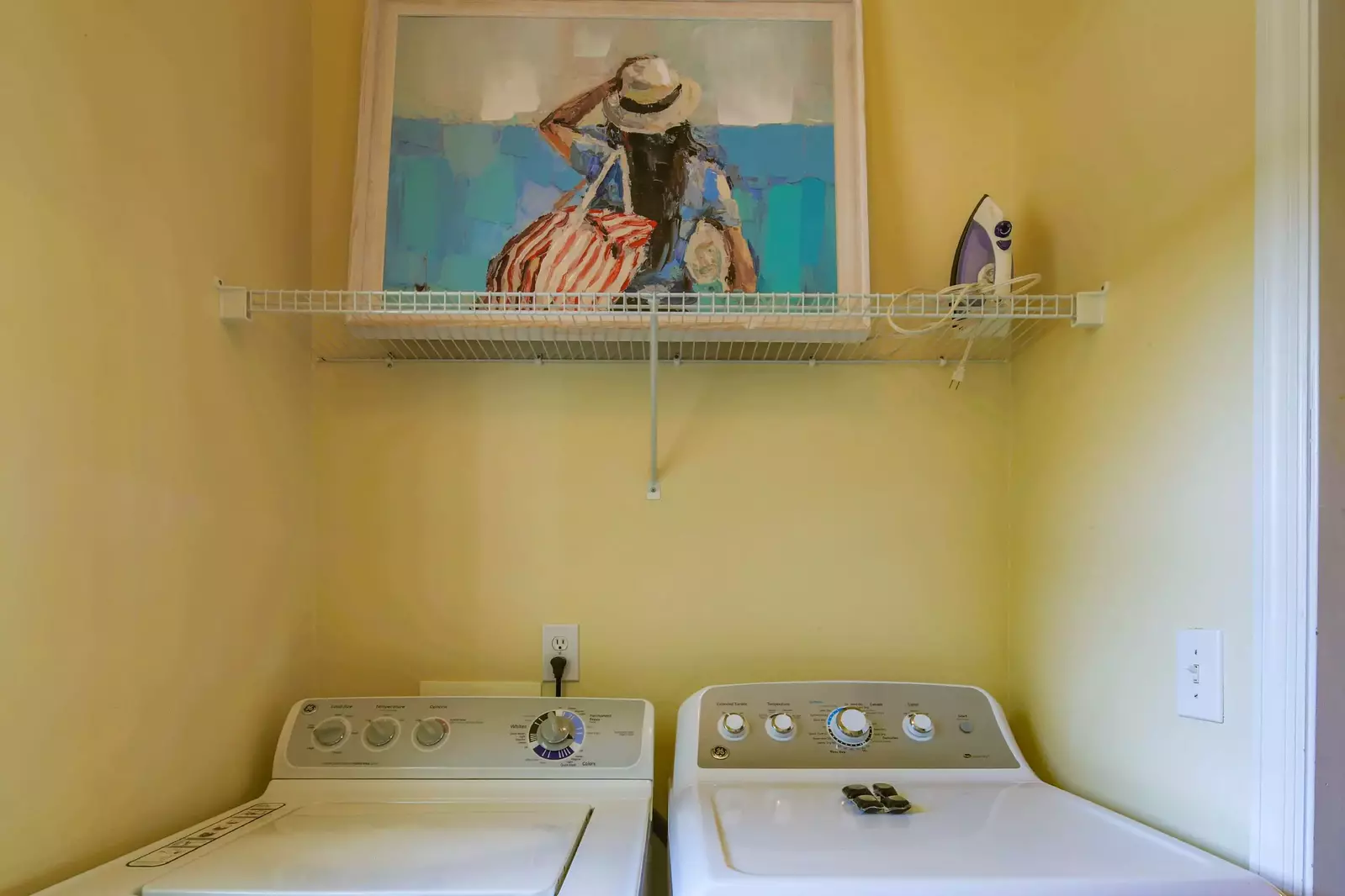 There is a full-sized washing machine and dryer in the condo.