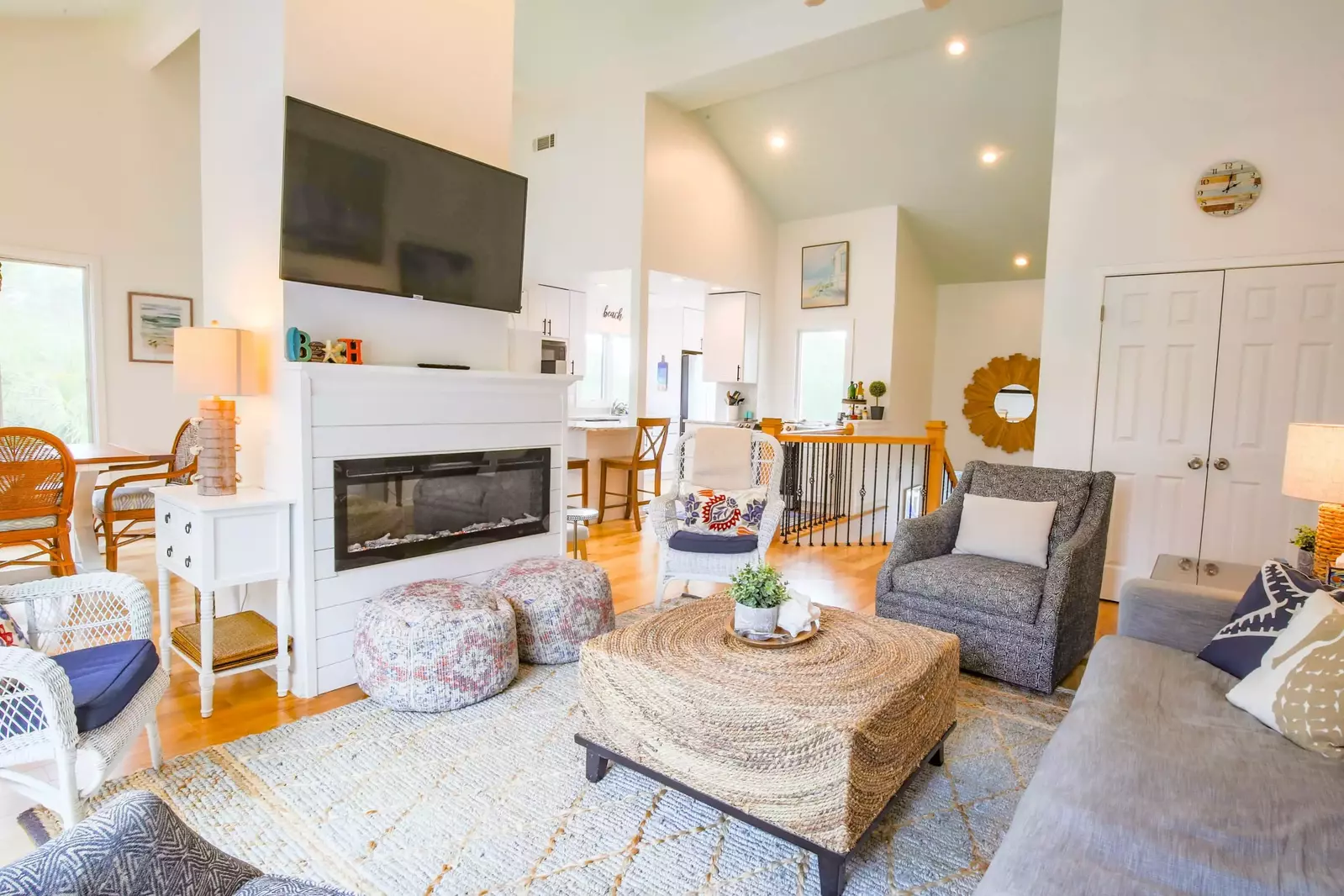 The open floor plan layout makes it very easy to interact with guests in the kitchen, dining & living room areas.