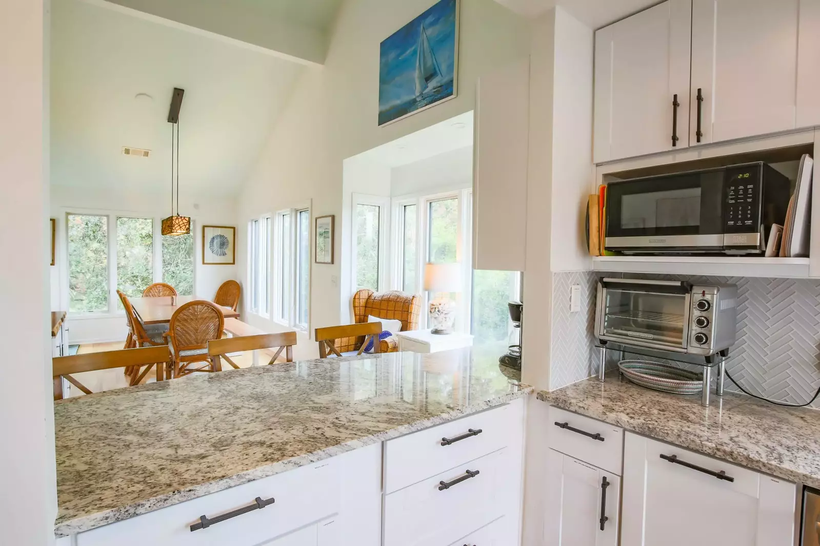 With its reverse floor plan, the Endless Summer kitchen, living room & dining area on the top floor receive terrific natural light.