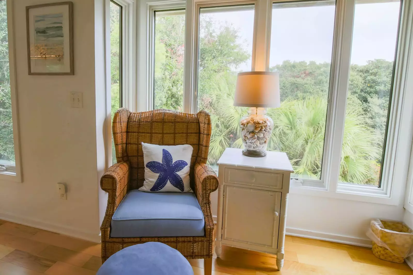 This armchair near the window is the perfect spot for your morning coffee or a good book.