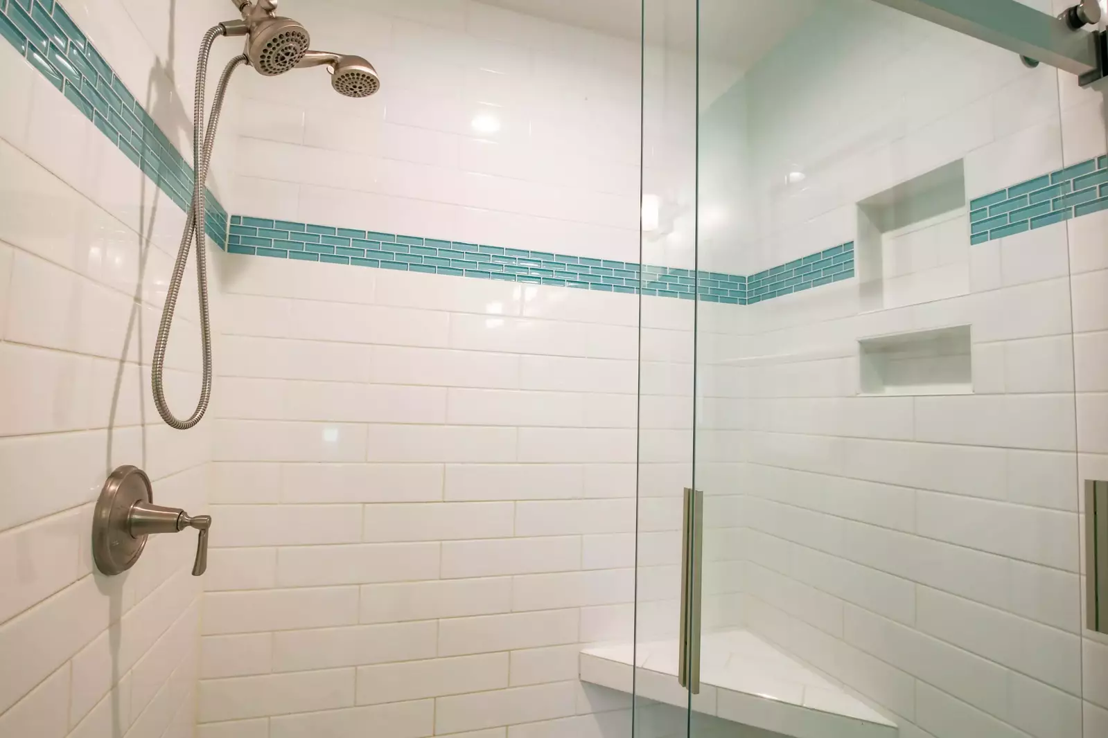 There's also a tiled, walk-in shower with two shower heads in the master bathroom.