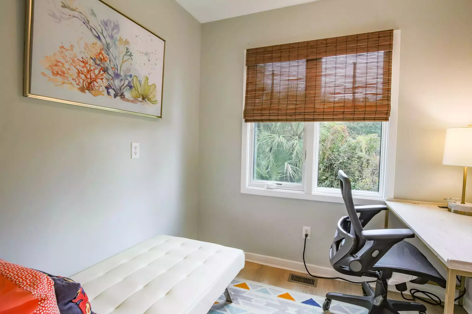 This office is located on the home's lower level near the front door.